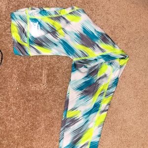 Blue, green, gray, and white leggings, size 14/16